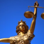 Canva - A Woman and Justice